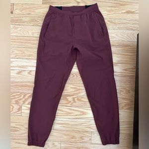 Lululemon men’s joggers in burgundy, size xs. Never worn.
